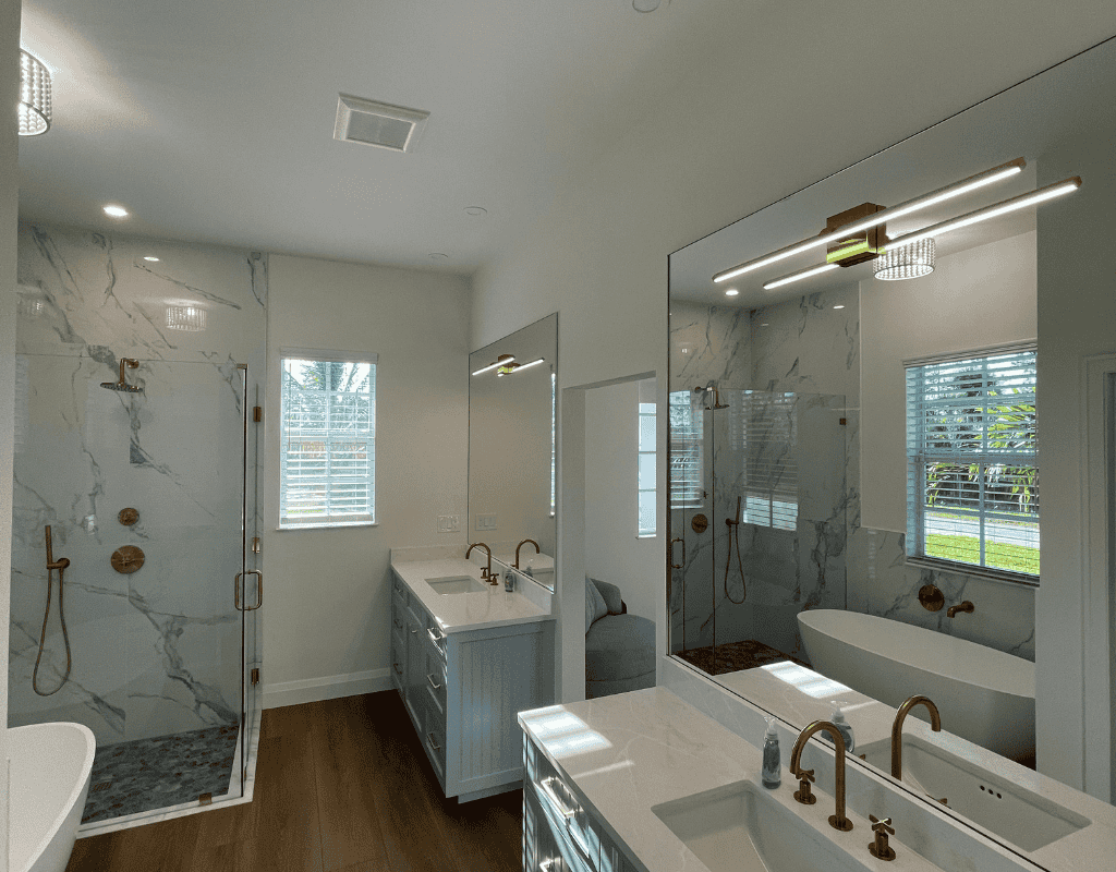 Electrician installing modern wall outlet and light switch in home